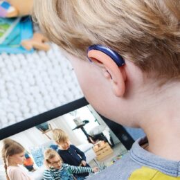 Kid wearing hearing aids